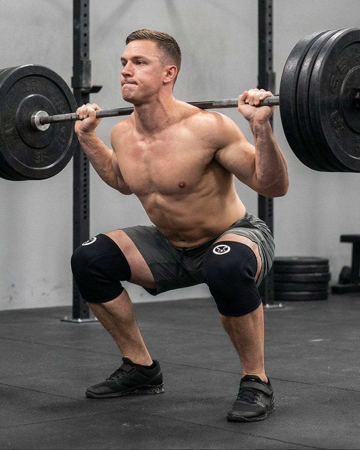 Side by side comparison of a barbell squat with and without Mammal Strength knee sleeves showing added knee support during heavy lifting