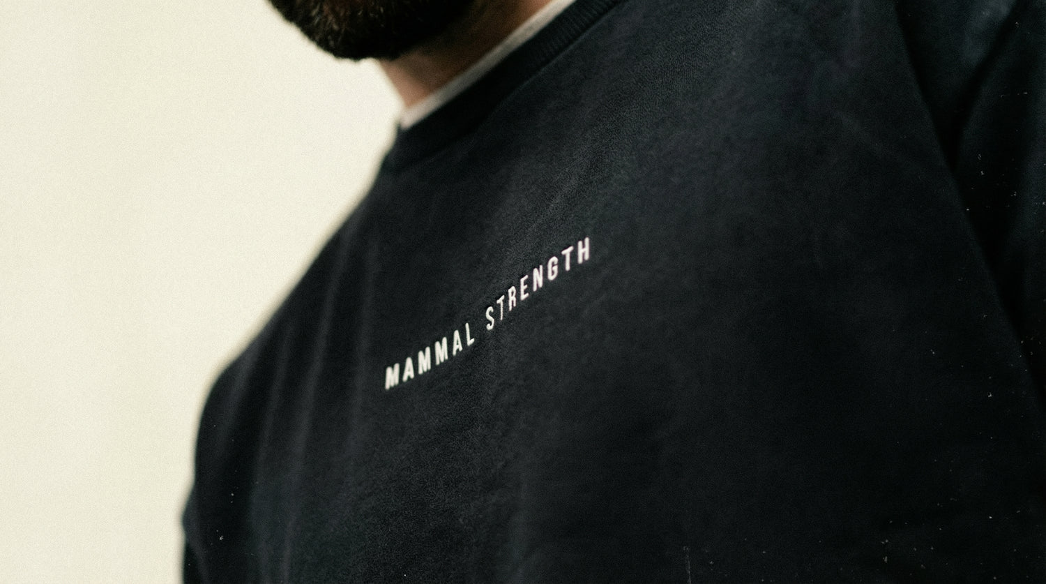 Mammal Strength black training sweatshirt with minimalist logo – premium gym and weightlifting apparel