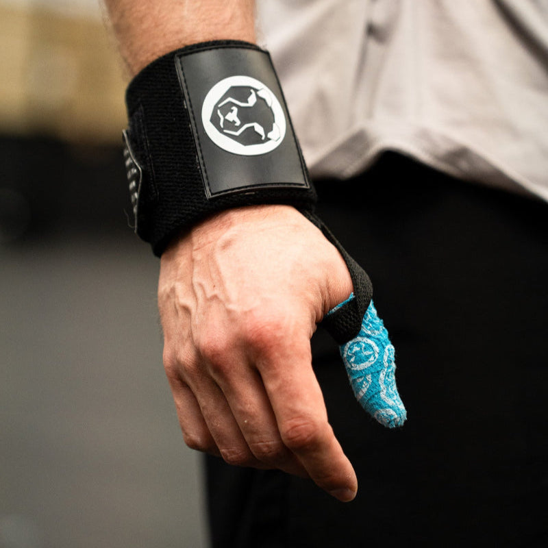 Load video: How to apply mammal thumb tape? - Mammal Strength Weightlifting Tape