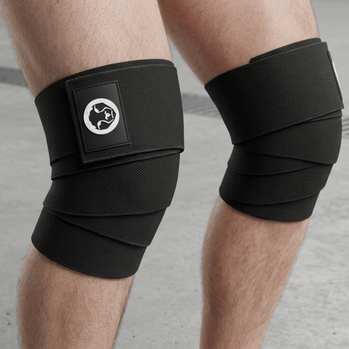 Mammal Strength black knee wraps worn for heavy squat and powerlifting knee support