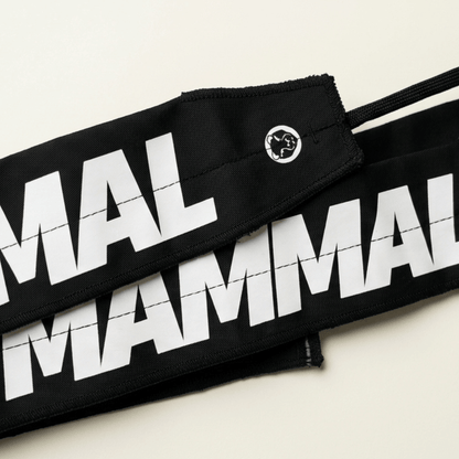 Close up of Mammal Strength lightweight wrist wraps showing reinforced stitching for weightlifting support