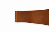Close-up detail of leather stitching on Mammal Olympic lifting straps